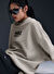 Nike HM4318-014 W NSW FLC OS CREW GLS Bej Kadın Yuvarlak Yaka Bol Kesim Baskılı Sweatshirt 